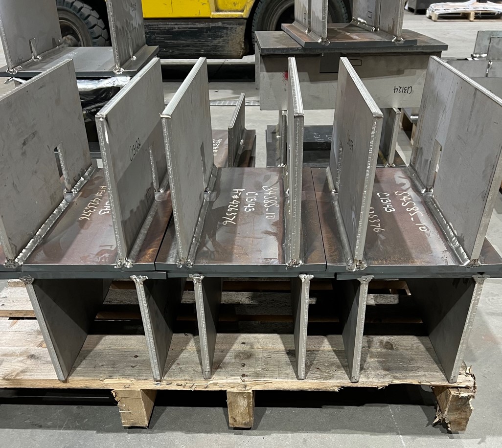 Fabricated steel assemblies